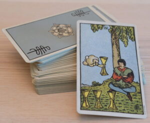 Tarot Deck Four of Cups scaled e1701568772139 300x246 - 2025 Psychic Astrology Predictions