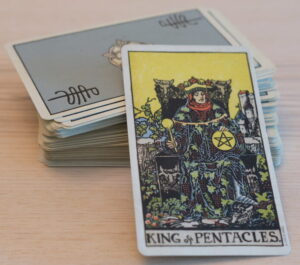 Tarot Deck King of Pentacles scaled e1701571554881 300x265 - Astrology Delivery In December