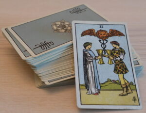 Tarot Deck Two of Cups scaled e1717359505711 300x233 - 2025 Psychic Astrology Predictions