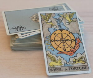 Tarot Deck Wheel of Fortune scaled e1713037059993 300x252 - Leo