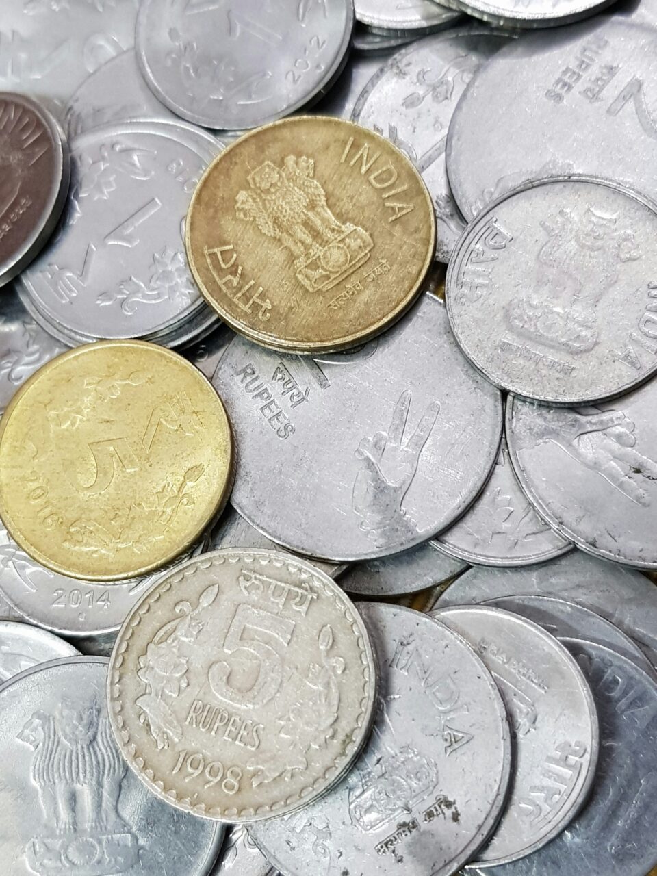 silver and gold round coins